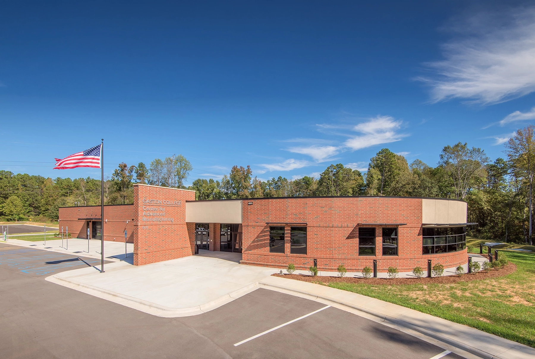 GastonCollegeCenterforAdvManufacturingClearSkyExteriorCropped-scaled